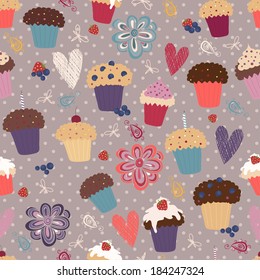 The seamless pattern with cupcakes, hearts, flowers, strawberries, blueberries and cherries. Popular flat background for web and mobile design. Cute and colorful textile. 