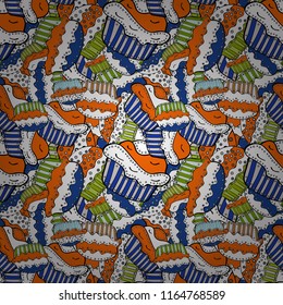 Seamless pattern of cupcakes on a white, orange and black background. Wrapping paper. Vector illustration.