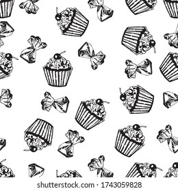 Seamless pattern with cupcakes on a white background.