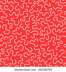 Seamless pattern of curved lines of white doodles on a bright red background.