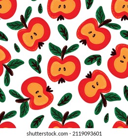 Seamless pattern with cut red apples on a blue background. Vector illustration