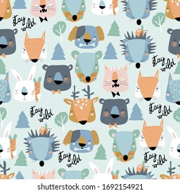 Seamless pattern of cute animals heads on blue background