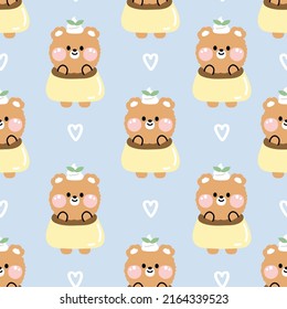 Seamless pattern of cute bear in puding costume with white heart.Funny animal cartoon character design.Kawaii.Vector.Illustration.