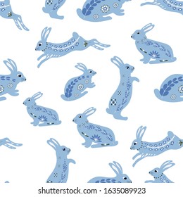 Seamless pattern of cute bunnies(rabbits, hares) on a white background in a Scandinavian style. Flat style, vector illustration.