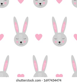 Seamless pattern with cute bunny face and hearts. Vector illustration