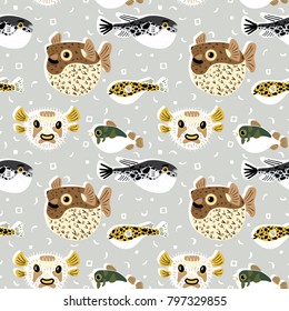Seamless pattern with cute cartoon blowfishes