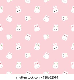Seamless Pattern of Cute Cartoon Bunny Face on Pastel Pink Background