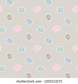 Seamless Pattern with Cute Cartoon Cat Face Design on Light Brown Background