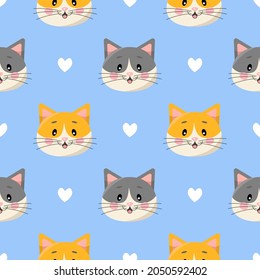 Seamless pattern with cute cartoon cats and hearts isolated on blue background