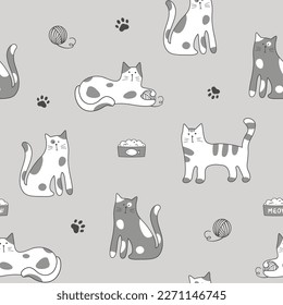 Seamless pattern with cute cartoon cats on gray background. Vector illustration in flat style. Can be used for fabric print, textile, wrapping paper, nursery room.