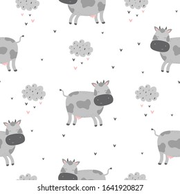 Seamless pattern with cute cartoon character cow. Print for baby shower party. Vector print with baby cow.