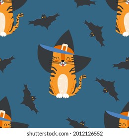 Seamless pattern cute cartoon character tabby cat wearing a witch hat and bats. Childrens vector Halloween background