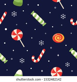 seamless pattern with cute cartoon christmas candy isolated on blue background. vector Illustration.