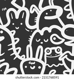 Seamless pattern with cute cartoon creatures on black background. Funny cartoon animals print. Doodle monster poster.