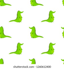 Seamless pattern with cute cartoon crocodile. Vector kids background.