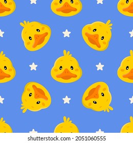 Seamless pattern with cute cartoon ducks and stars isolated on blue background