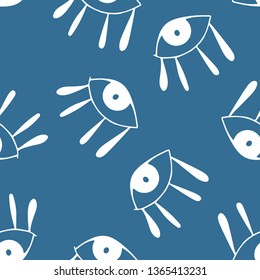 Seamless pattern with  cute cartoon eyes in abstract style. White graphic drawnig of eyeballs with eyelashes on blue background. Trendy modern poster. 