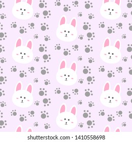 seamless pattern with cute cartoon rabbit face design on pink background and paws