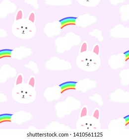 seamless pattern with cute cartoon rabbit face design on pink background and rainbow