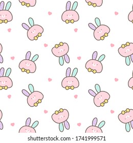 Patrón sin inconvenientes de la cara de conejo de dibujos animados y diseño cardíaco en fondo blanco