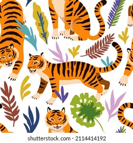 Seamless pattern with cute cartoon tigers and doodle tropical leaves. 