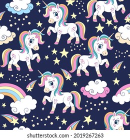 Seamless pattern with cute cartoon unicorns, rainbow and cosmic elements. Vector illustration in trendy colors for design, party, print, wallpaper, decor, goods, dishes, bed linen and kids apparel