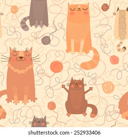 Seamless pattern with cute cats and balls of yarn. Vector illustration.