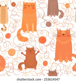 Seamless pattern with cute cats and balls of yarn. Vector illustration.