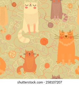 Seamless pattern with cute cats and balls of yarn. Vector illustration.