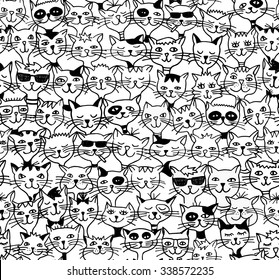 Seamless pattern of cute cats - black and white drawing