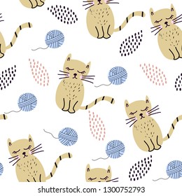 Seamless pattern with cute cats in scandinavian style.Creative nursery background. Perfect for kids design, fabric, wrapping, wallpaper, textile . Vector Illustration.