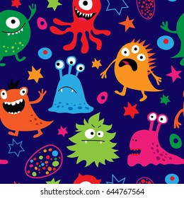 Seamless pattern with a cute cheerful multi-colored monsters