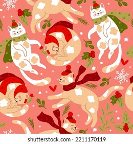 Seamless pattern with cute Christmas cats in hats and scarves. Vector graphics.