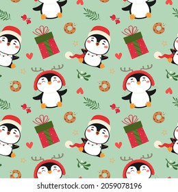Seamless pattern with cute Christmas penguins and elements. Festive vector illustration.