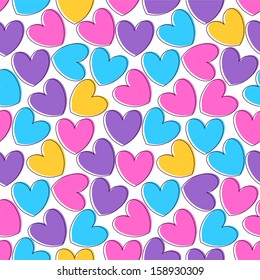 Seamless pattern with cute colorful hearts