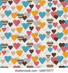 Seamless pattern with cute colorful hearts