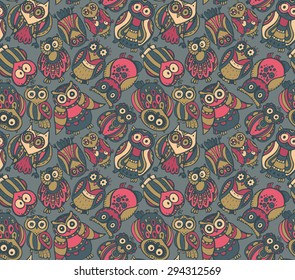 Seamless pattern with cute colorful owls. Hand drawn graphic design.