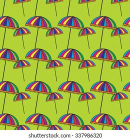 Seamless pattern with cute colorful umbrellas. Vector background