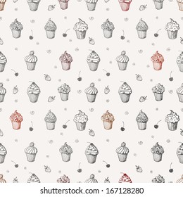 Seamless pattern with cute cupcakes