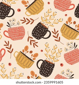 Seamless pattern with cute cups and seasonal plants and branches, autumn color vector illustration