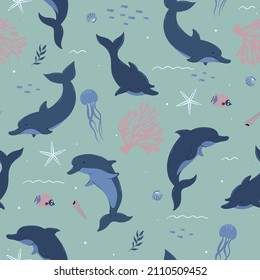 Seamless pattern with cute dolphins and marine life. Vector graphics.