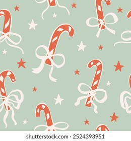 Seamless pattern with Cute doodle candy canes with bows.  Hand drawn vector illustration. Naive coquette core design. Funny Christmas background, wrapping paper.