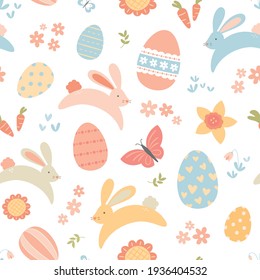 Seamless pattern of cute Easter bunnies, eggs and colorful flowers isolated on white background