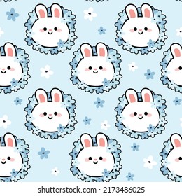 Seamless pattern of cute face rabbit with hydrangea flower.Cartoon animal design.Blue background.Kawaii.Vector.Illustration.