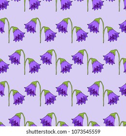 Seamless pattern. Cute pattern in flower. Purple bells. Light violet background. Ditsy floral.