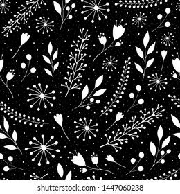 seamless pattern with cute flowers and sprigs on a black background
