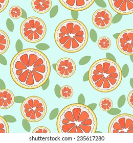 Seamless pattern with cute freehand grapefruits and small leaves on light blue background