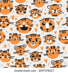 Seamless pattern with cute funny cartoon tigers in naive kid drawn style. Tiny animal muzzles.