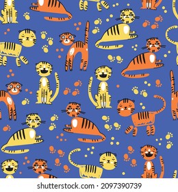 Seamless pattern with cute funny cartoon tigers in naive kid drawn style. Tiny animal characters.