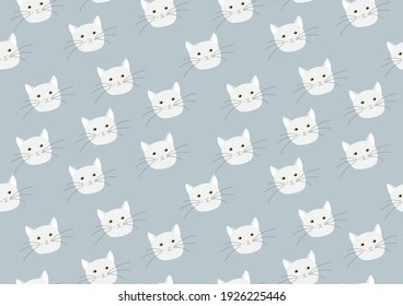 Seamless pattern with cute, funny cat heads on a blue background